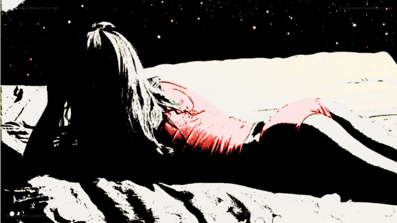 woman lying on a bed