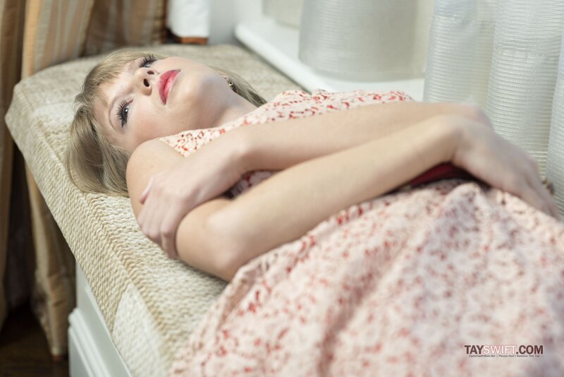 woman lying on a bench