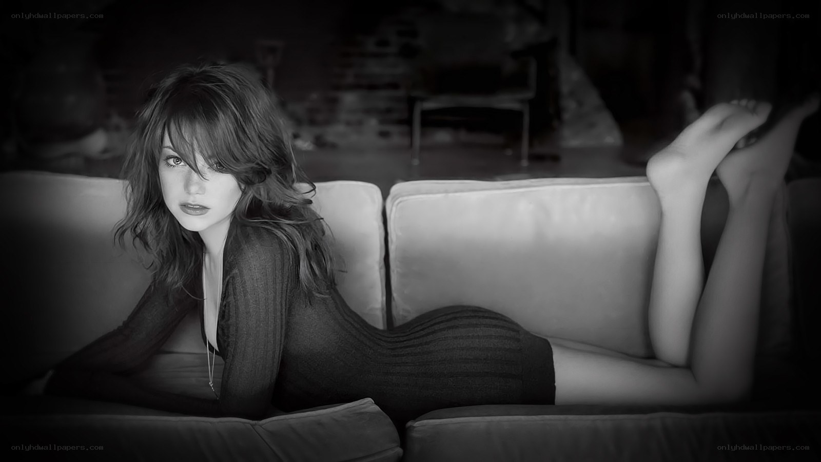 woman lying on a couch