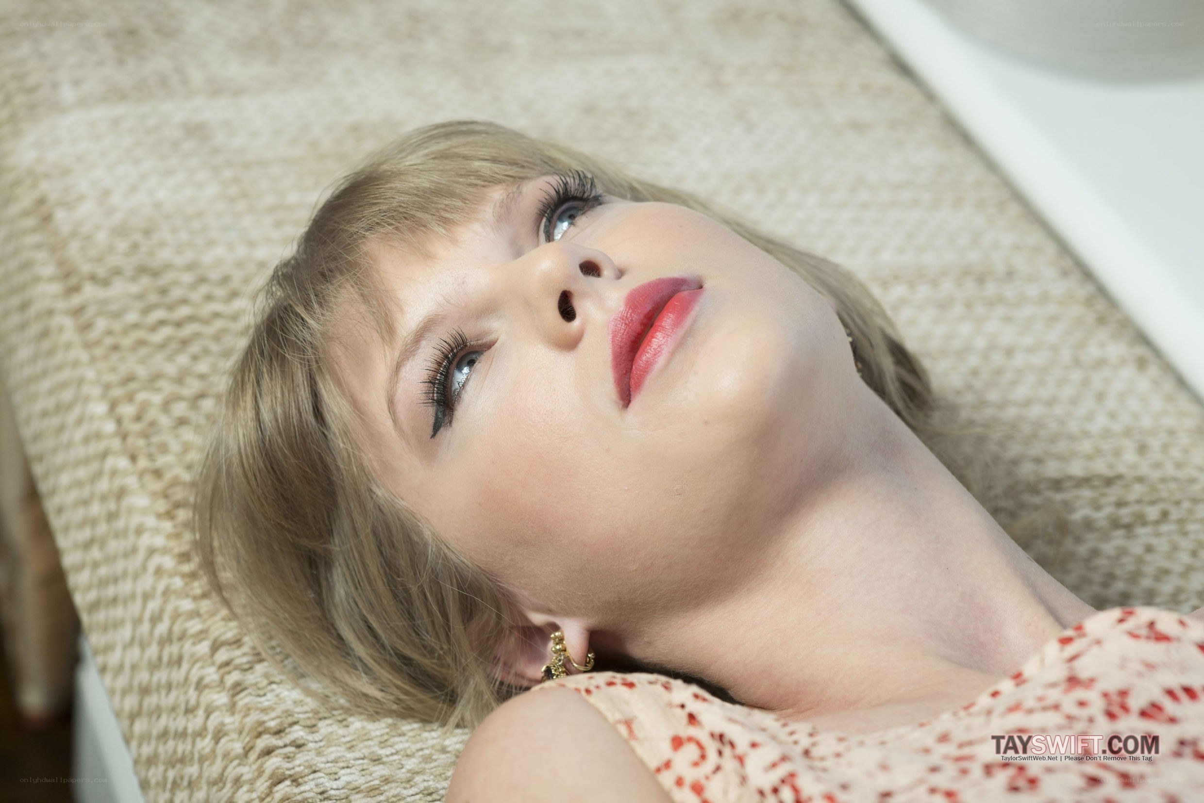 woman lying on a couch