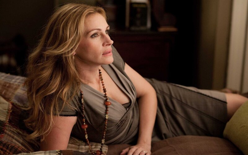 woman lying on a couch