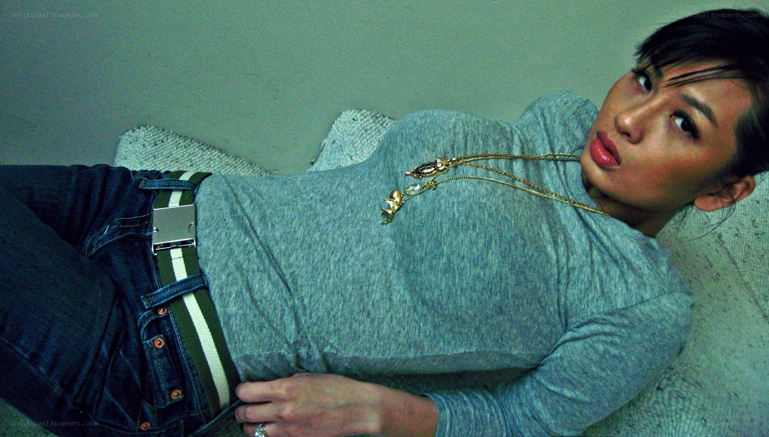 woman lying on a couch