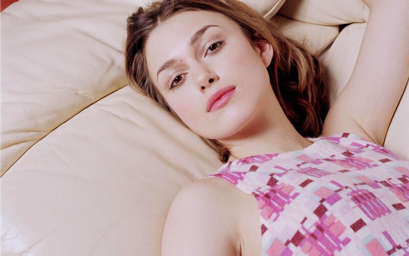 woman lying on a couch