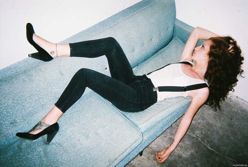 woman lying on a couch