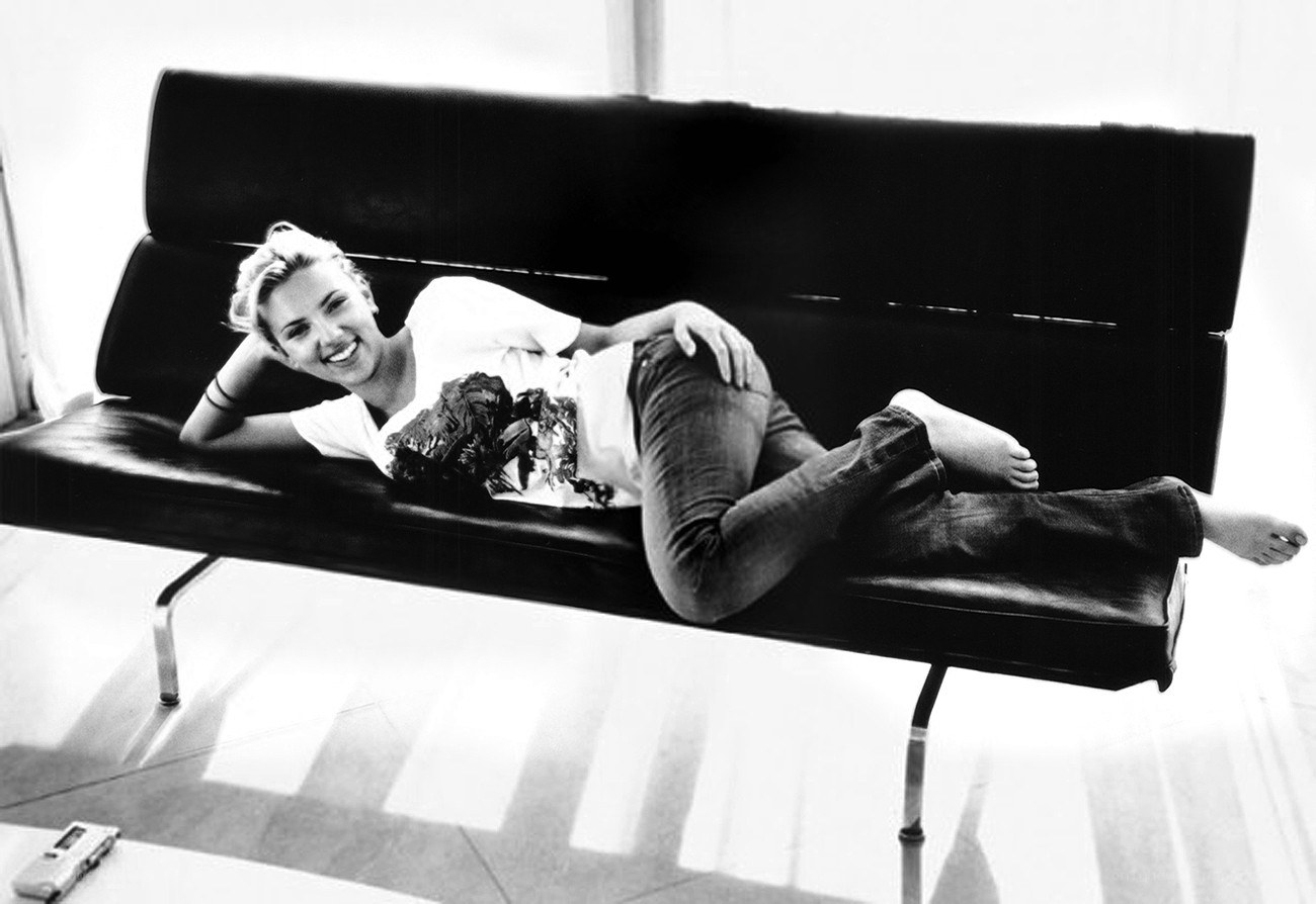 woman lying on a couch
