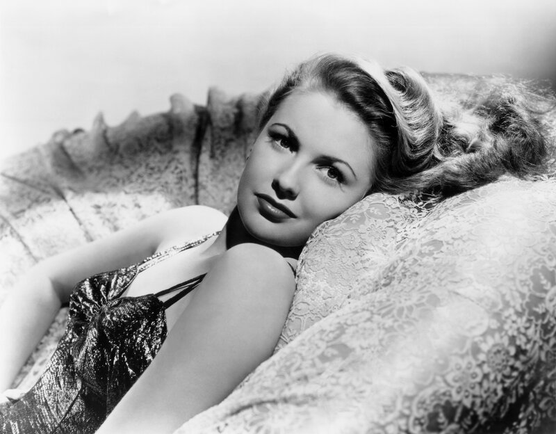 Woman Lying on a Couch — Black, Calm, Photograph