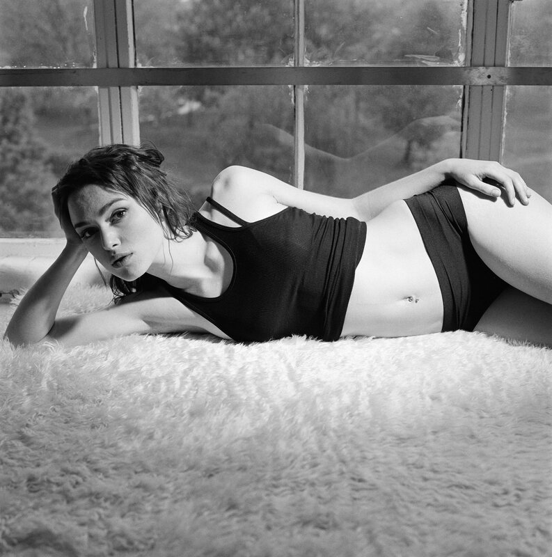 woman lying on a rug