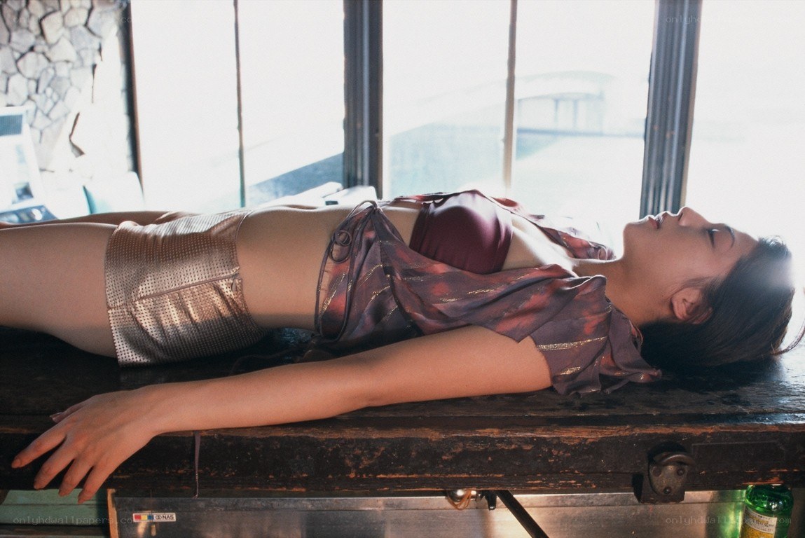 woman lying on a table