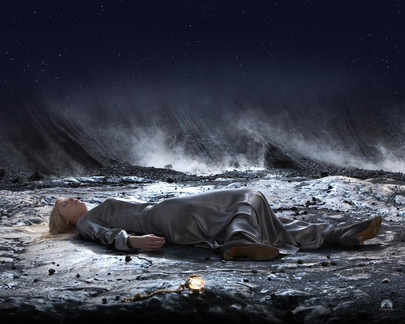 Woman lying on alien ground