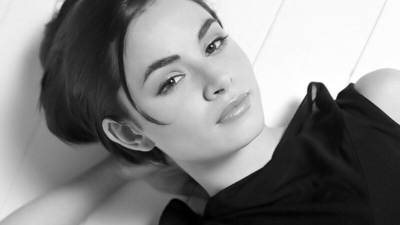 Woman Lying on Back — Black, Calm, Photograph, Black Top, White Background