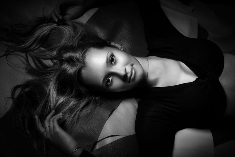 Woman Lying on Back — Black, Dramatic, Photograph, Hair, Necklace