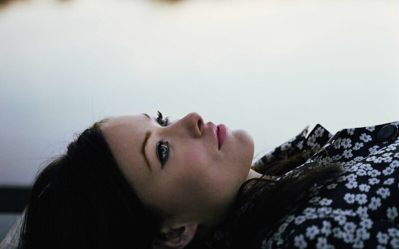 woman lying on back looking up