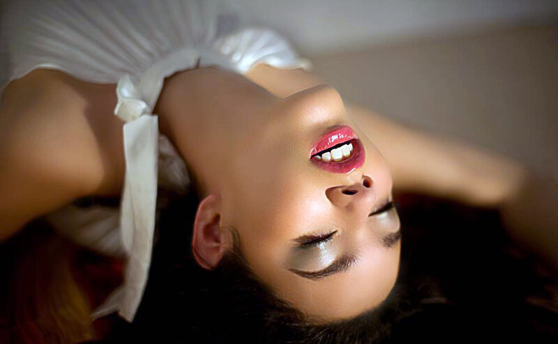 Woman Lying on Back — White, Dramatic