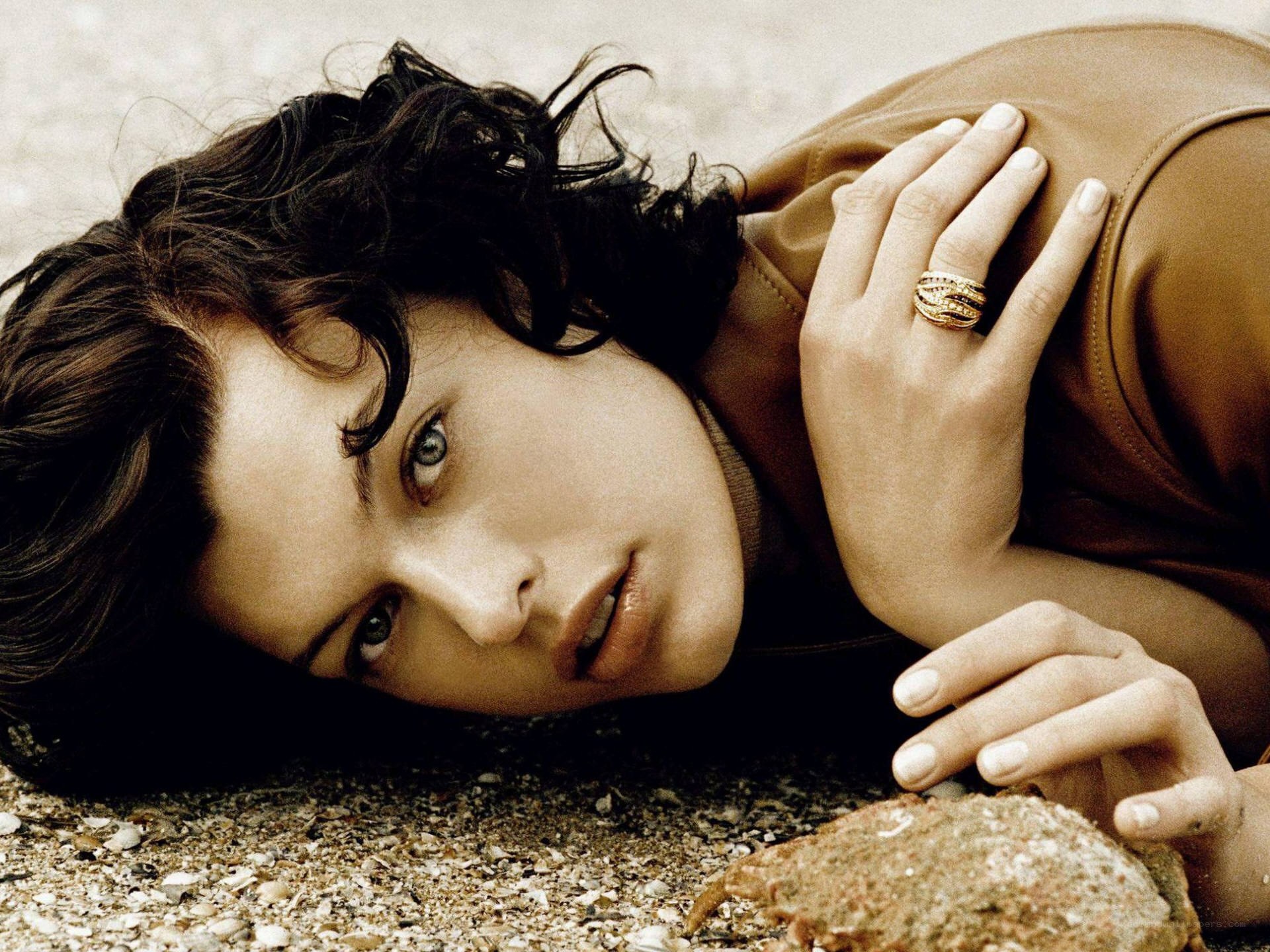 woman lying on beach