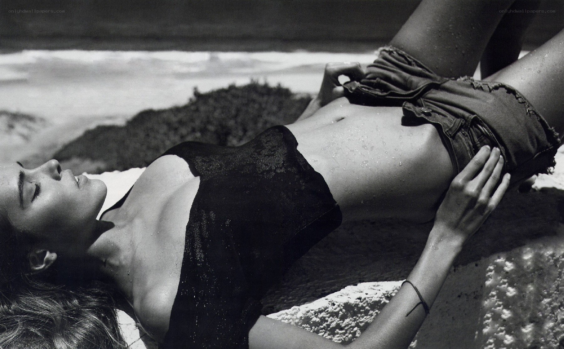 woman lying on beach