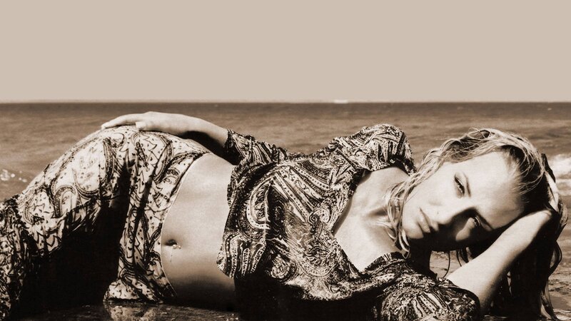 woman lying on beach