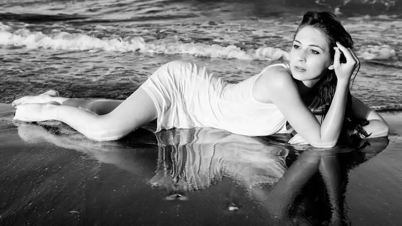 woman lying on beach