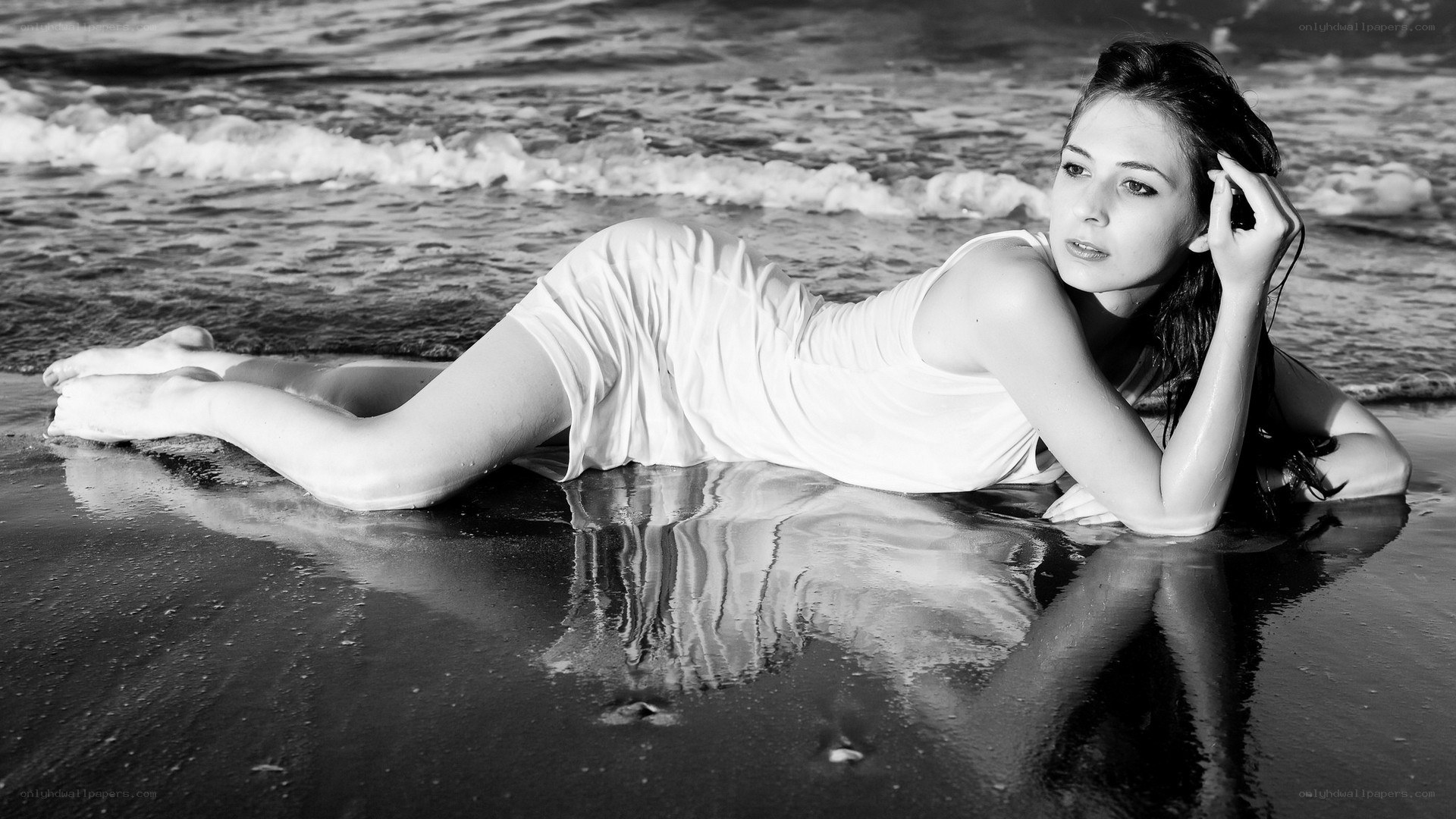 woman lying on beach