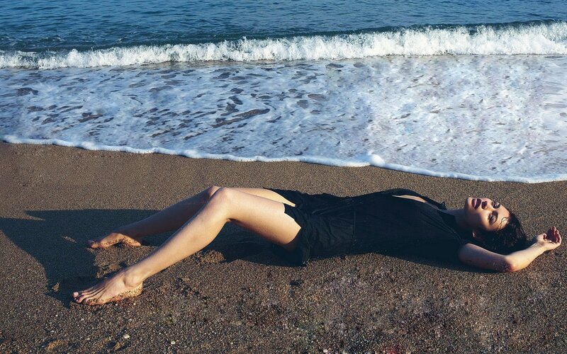Woman Lying on Beach — Black, Serene, Afternoon, Photograph, Ocean, Sand, Waves