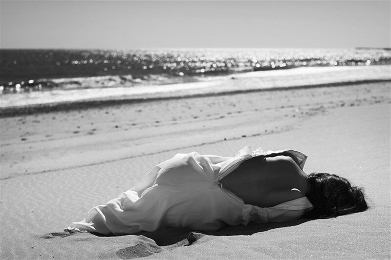 Woman Lying on Beach — Black, Serene, Afternoon, Photograph, Ocean