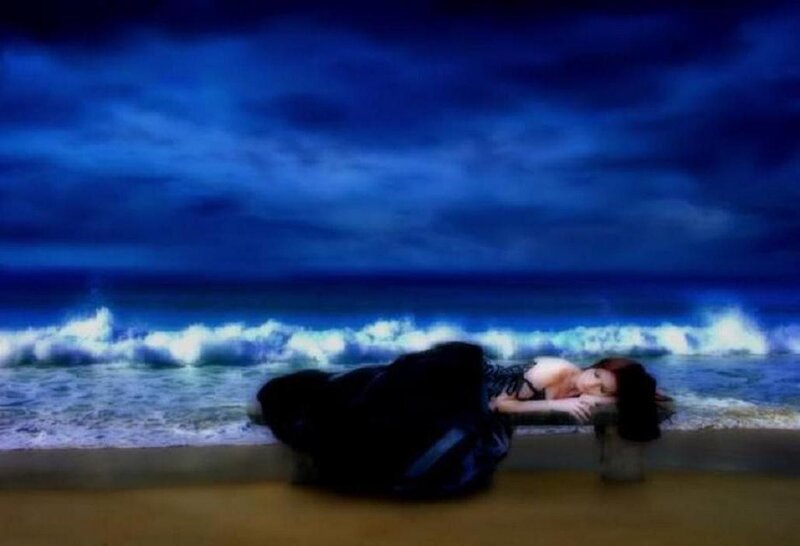 Woman Lying on Beach — Blue, Dramatic
