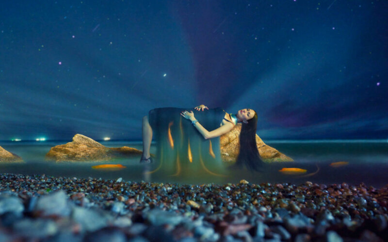 Woman Lying on Beach — Blue, Serene, Night