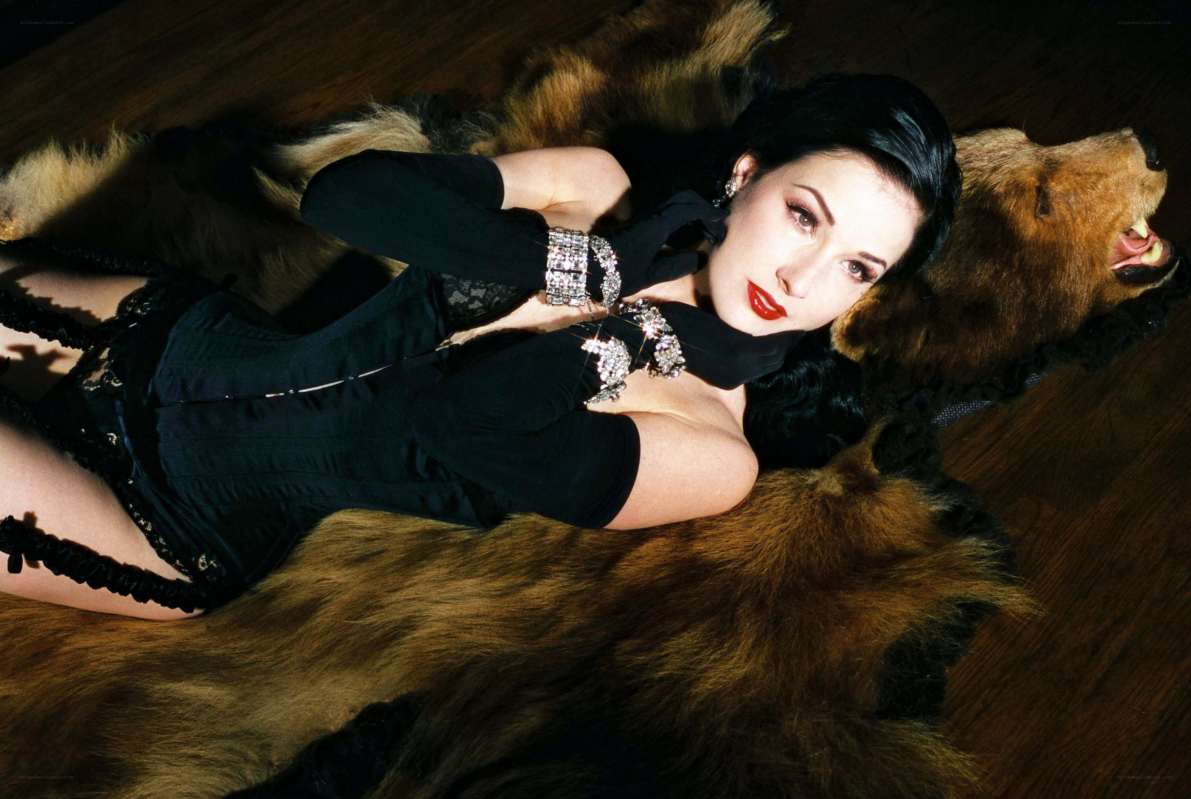 woman lying on bear rug