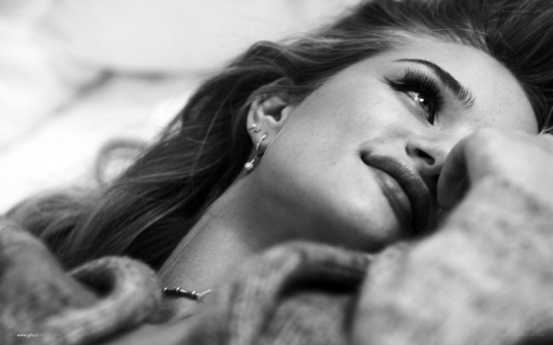 woman lying on bed