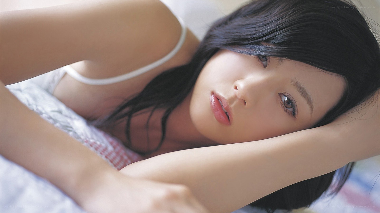 woman lying on bed
