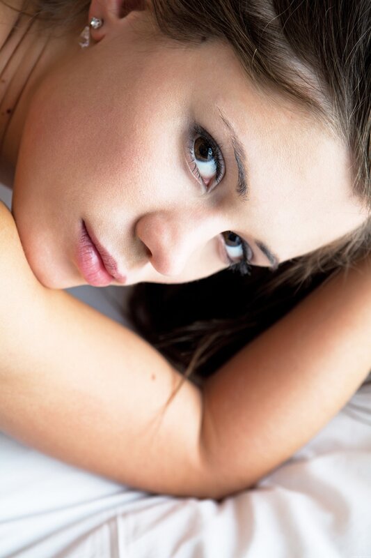 woman lying on bed