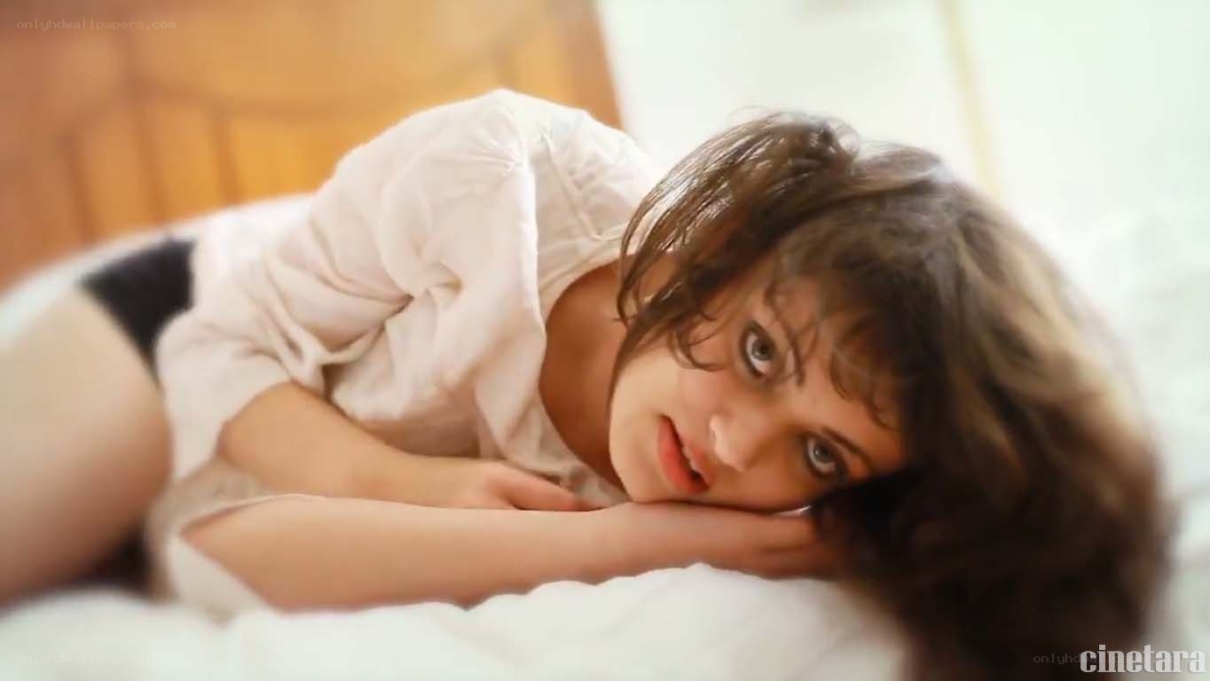 woman lying on bed