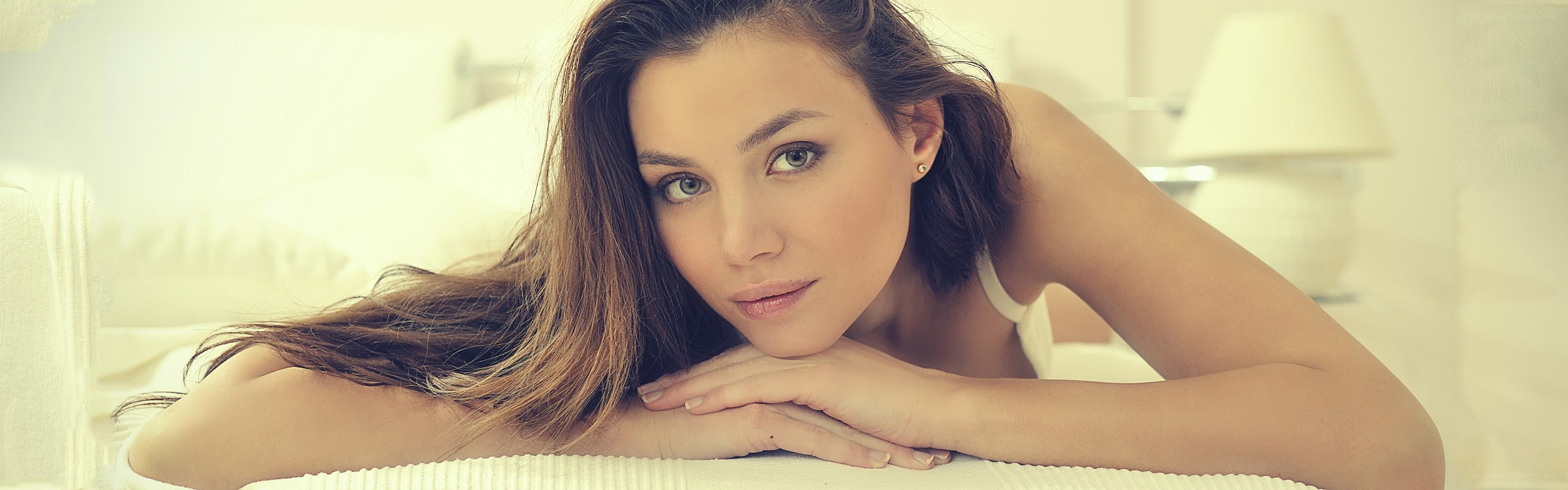 woman lying on bed