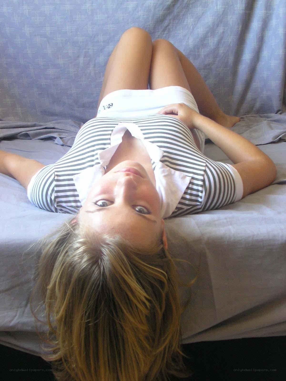 woman lying on bed