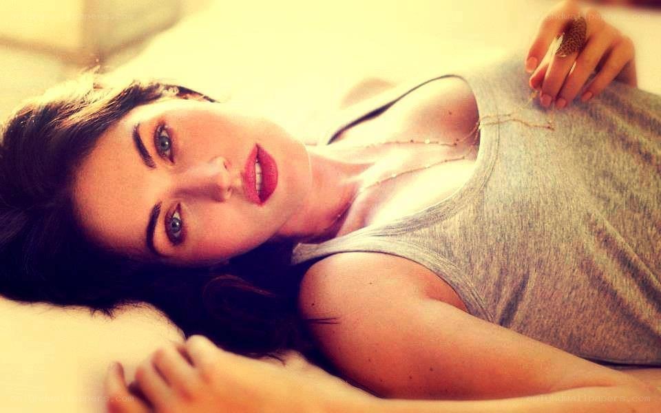 woman lying on bed