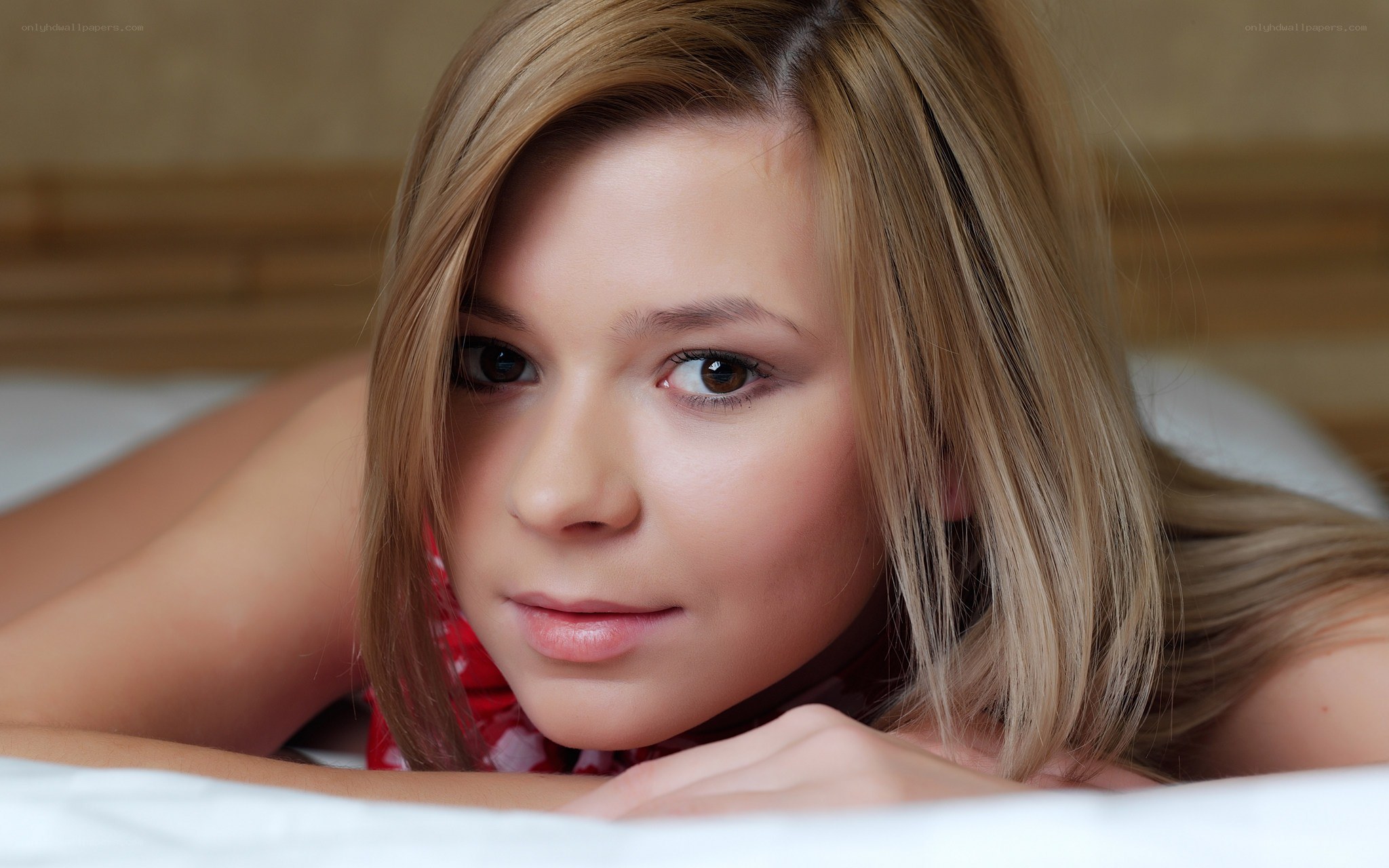 woman lying on bed