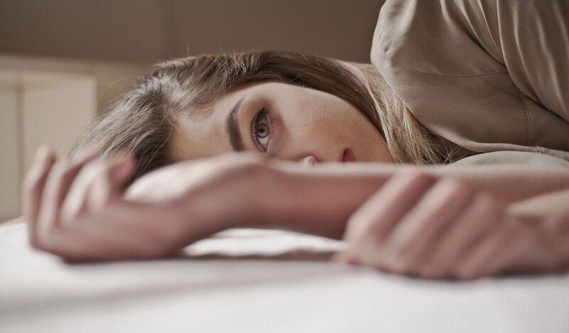 Woman Lying on Bed — Beige, Calm, Morning, Photograph