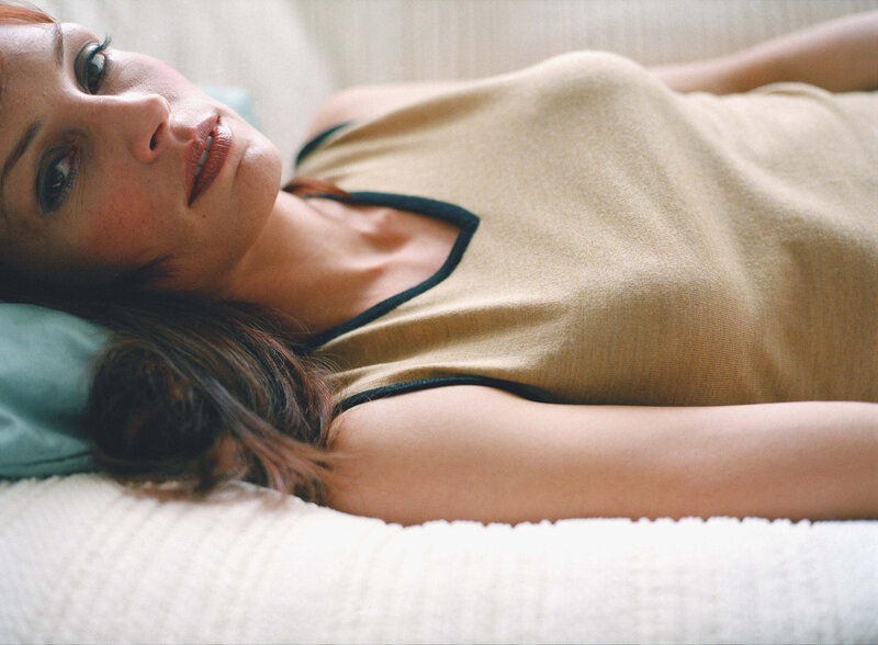 Woman Lying on Bed — Beige, Calm, Photograph, Pillow, Sweater