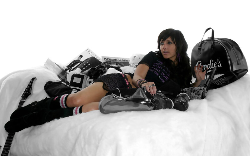 Woman Lying on Bed — Black, Casual
