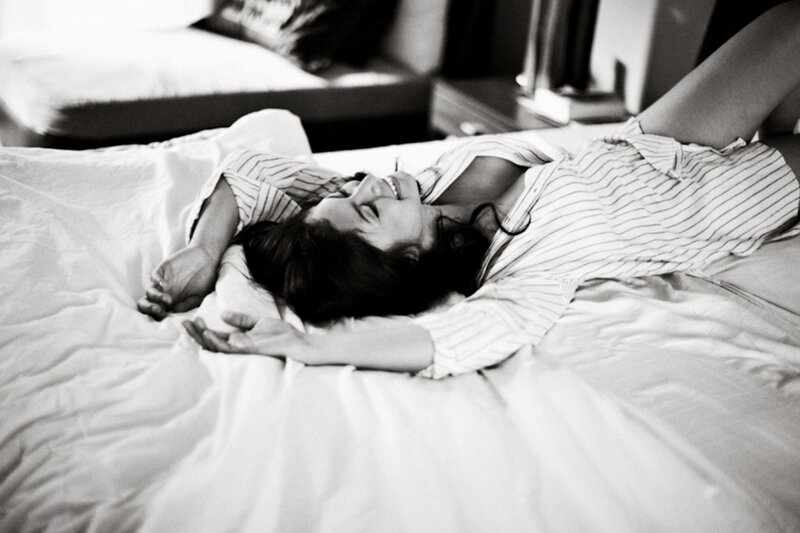Woman Lying on Bed — Black, Relaxed, Morning, Photograph, Pillow