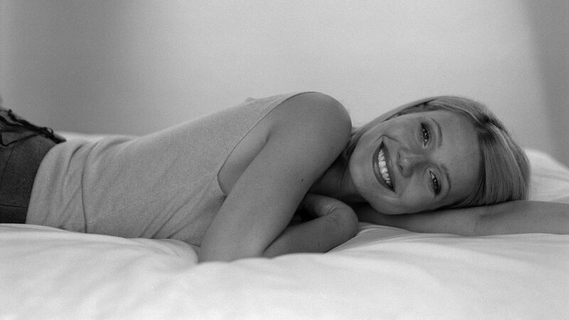 Woman Lying on Bed — Black, Relaxed, Photograph, Pillow, White