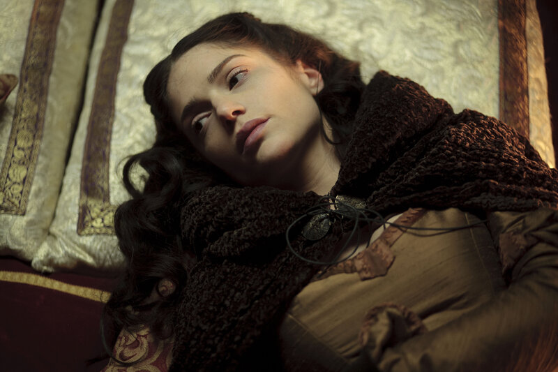 Woman Lying on Bed — Brown, Dramatic