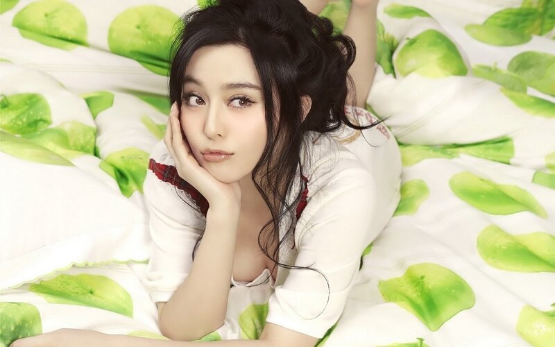 Woman Lying on Bed — Green, Relaxed, Photograph, Pillow, White Shirt