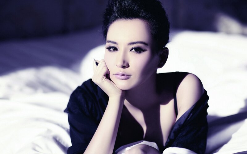 Woman Lying on Bed — Purple, Dramatic, Photograph, Black Top