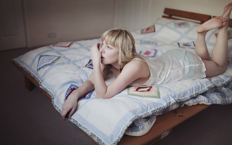 Woman Lying on Bed — White, Calm, Morning, Photograph, Quilt