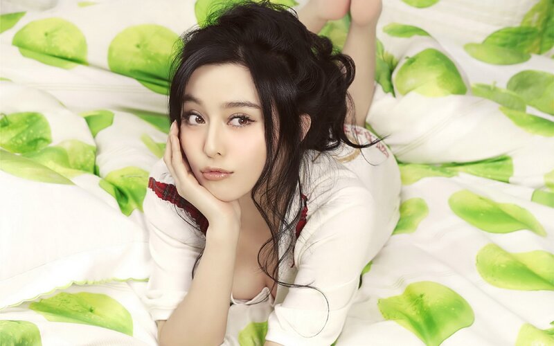 Woman Lying on Bed — White, Relaxed, Photograph, Pillow, Clothing