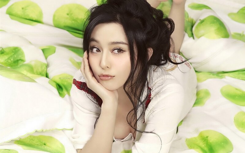 Woman Lying on Bed — White, Relaxed, Photograph, Pillow, Hand