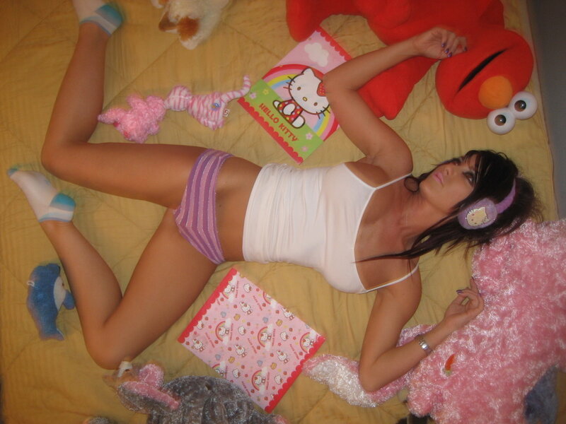 Woman Lying on Bed — Yellow, Relaxed, Photograph, Stuffed Animals