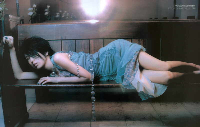 Woman Lying on Bench — Blue