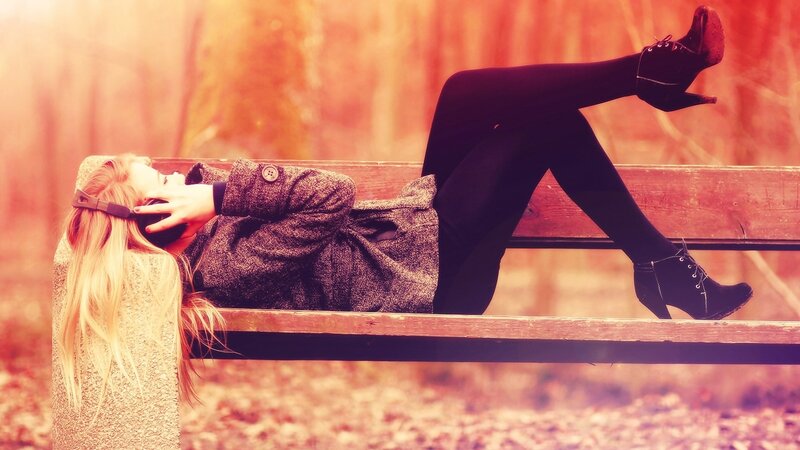 Woman Lying on Bench — Red, Relaxed