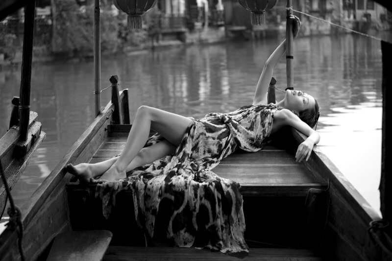 Woman Lying on Boat — Black